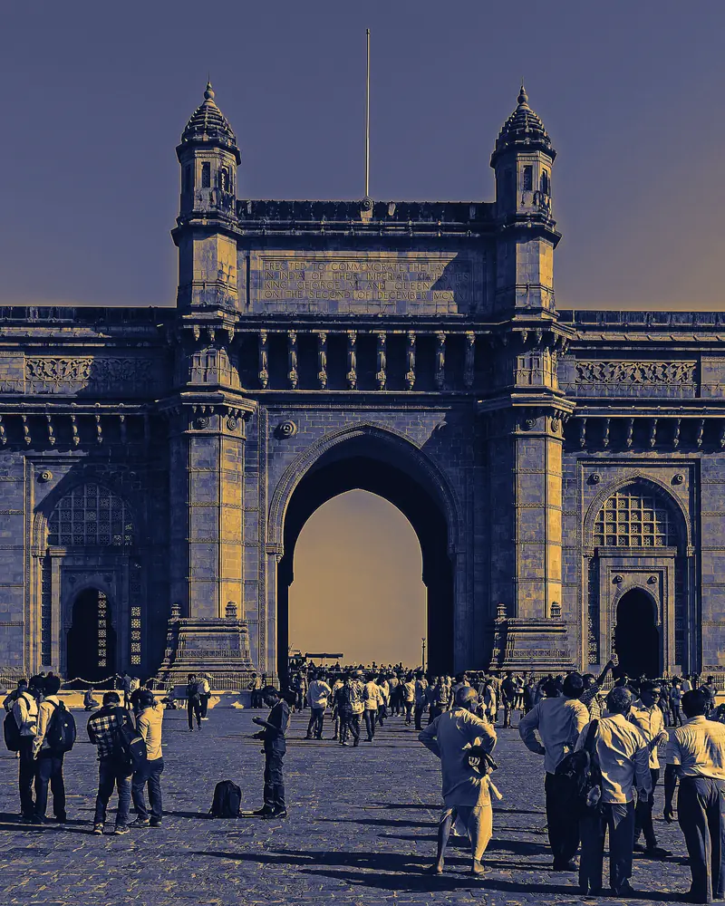 Gateway of India in Mumbai, in navy and gold tones